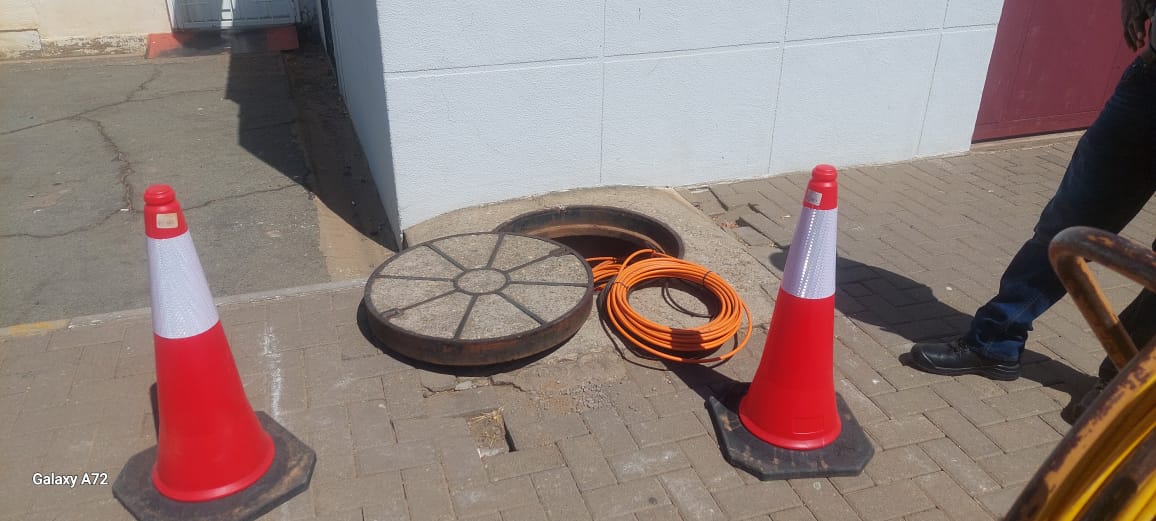 Fiber installation on existing manholes
